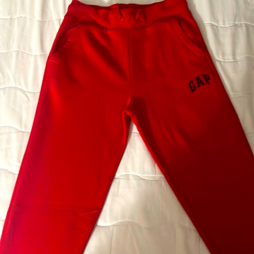 Gently used, size: XL (12), red sweatpants.